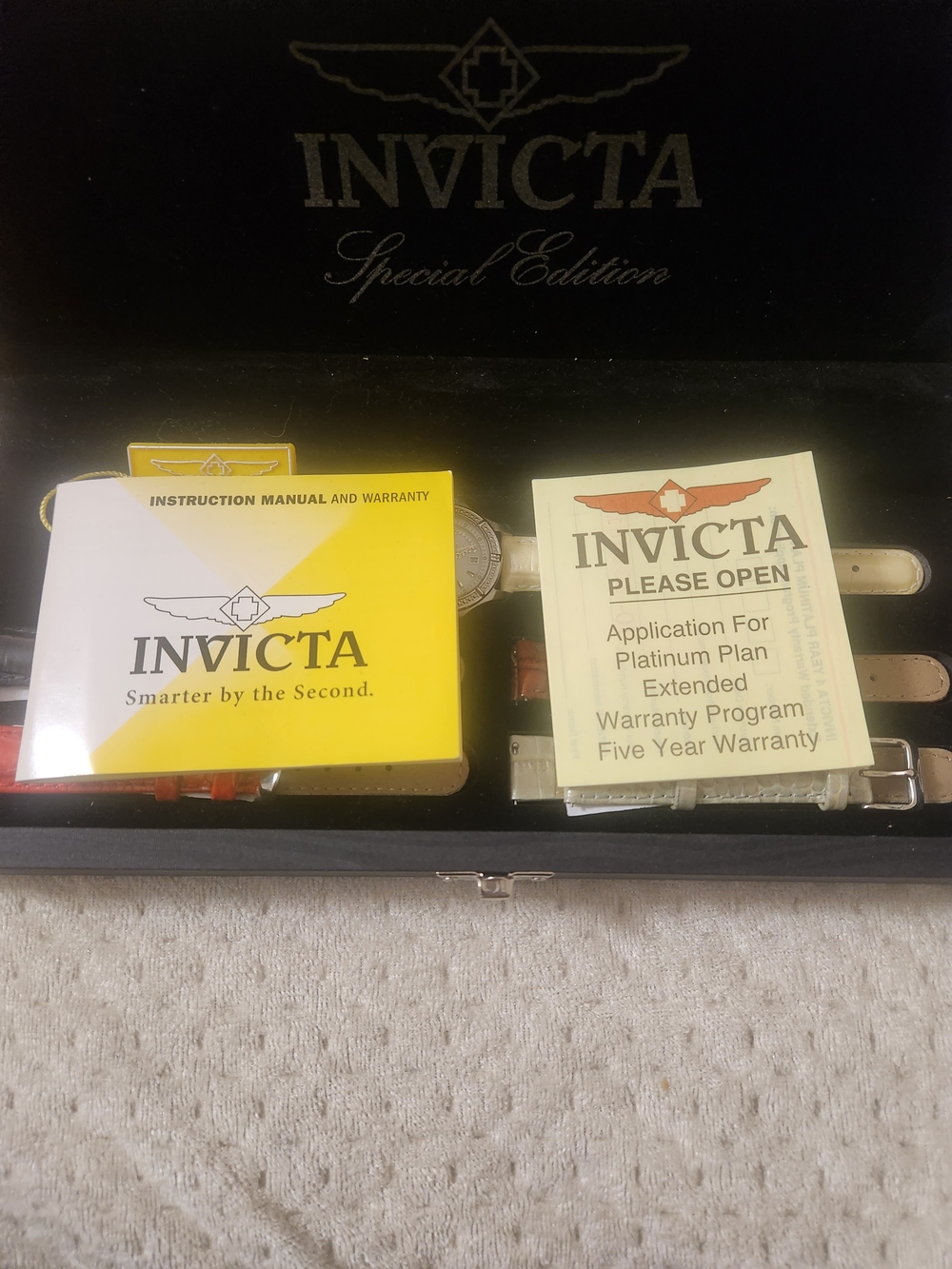 Invicta Watch Set with Black Case and Yellow Manuals